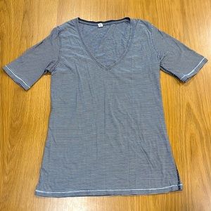 Lululemon street wear. Size 4 short sleeve, deep V neck T